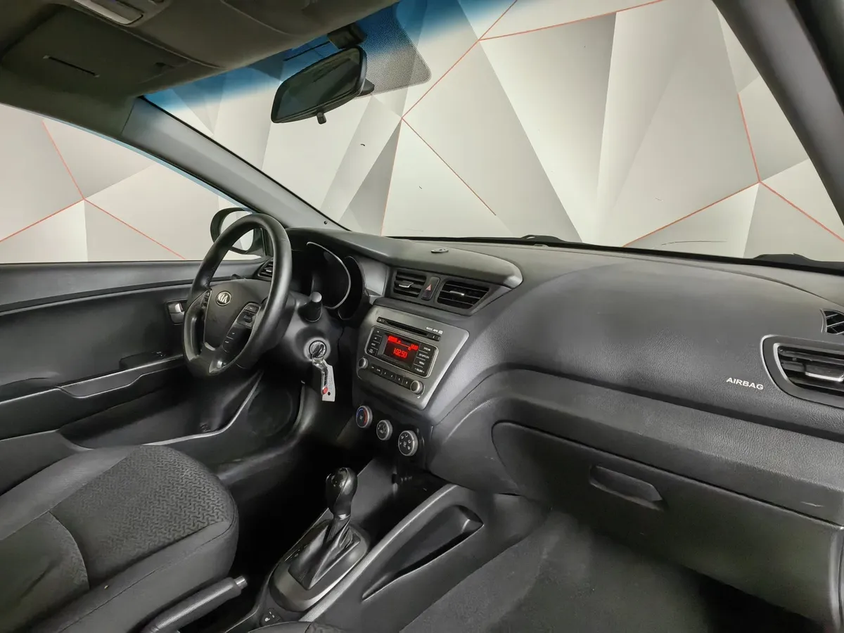 Kia Rio 1.6 AT (123 л.с.) Белый в АВИЛОН. Слайд №12
