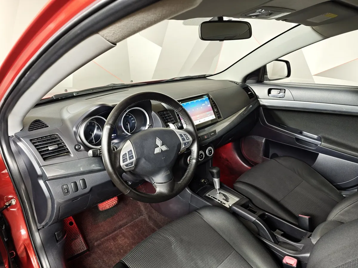 Mitsubishi Lancer 1.8 CVT (143 л.с.) Красный в АВИЛОН. Слайд №19