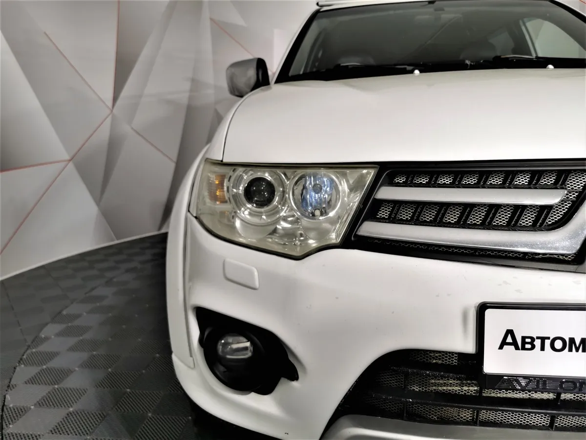 Mitsubishi Pajero Sport 2.5 DI-D AT AWD (178 л.с.) Белый в АВИЛОН. Слайд №10