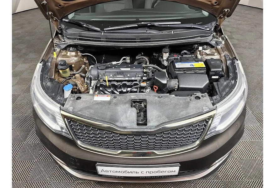 Kia Rio 1.4 AT (107 л.с.) Коричневый в АВИЛОН. Слайд №11