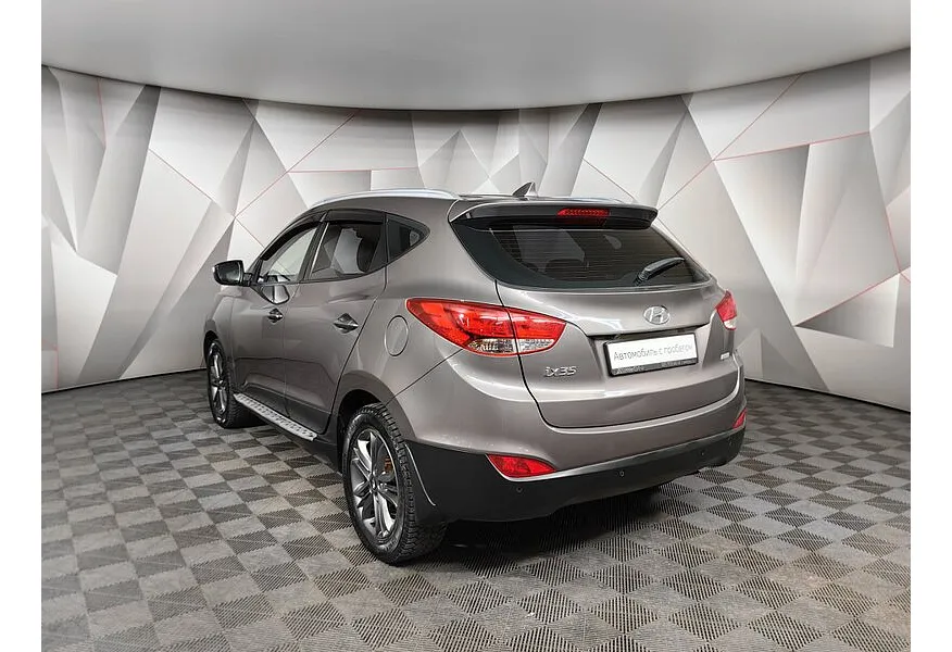 Hyundai ix35 2.0 AT 4WD (150 л.с.) Travel Коричневый в АВИЛОН. Слайд №4