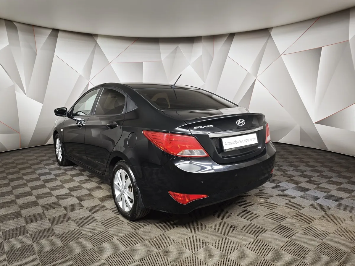 Hyundai Solaris 1.4 AT (107 л.с.) Style Черный в АВИЛОН. Слайд №4