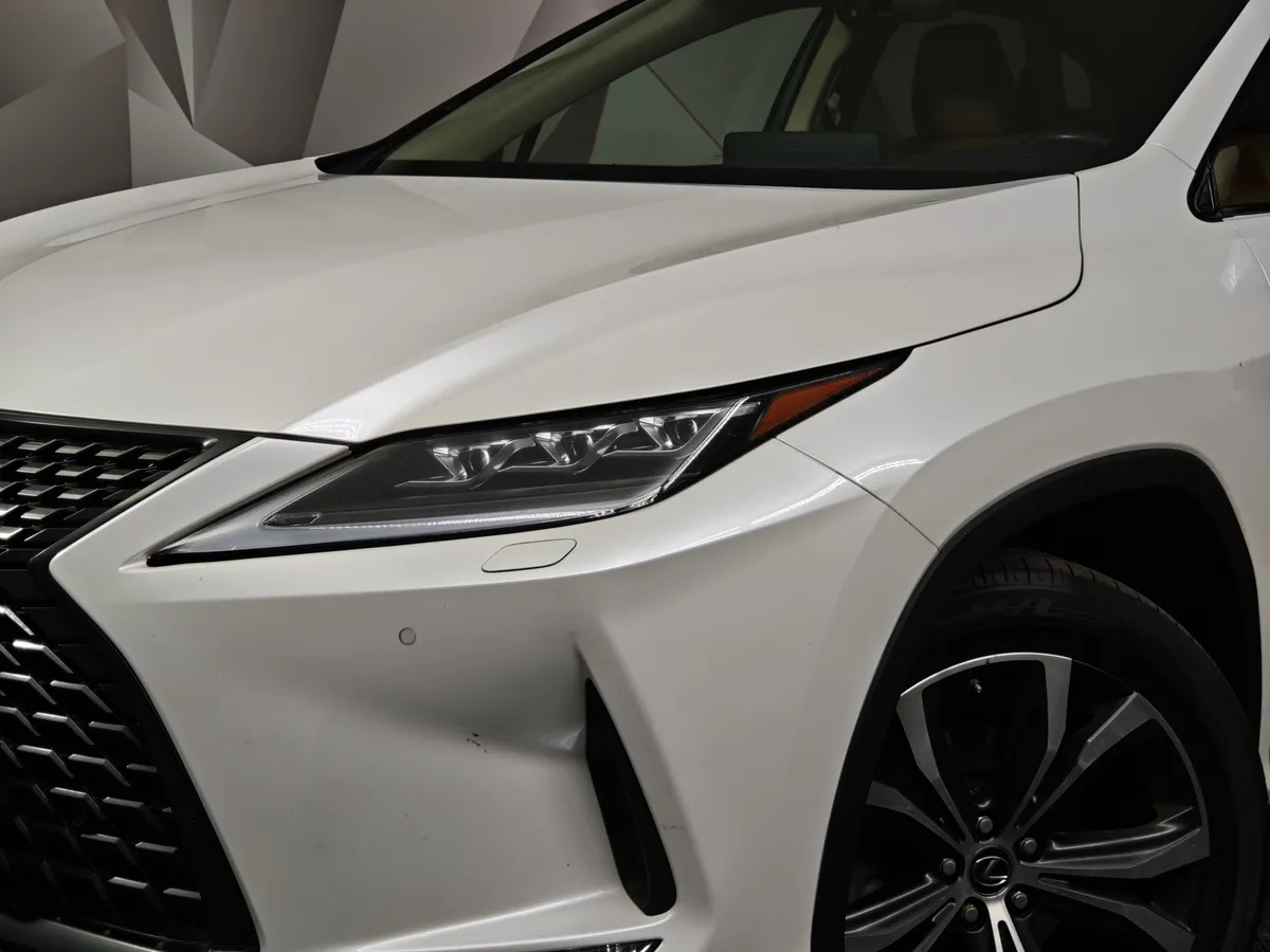 Lexus RX 2.0 AT AWD (238 л.с.) Executive Белый в АВИЛОН. Слайд №10