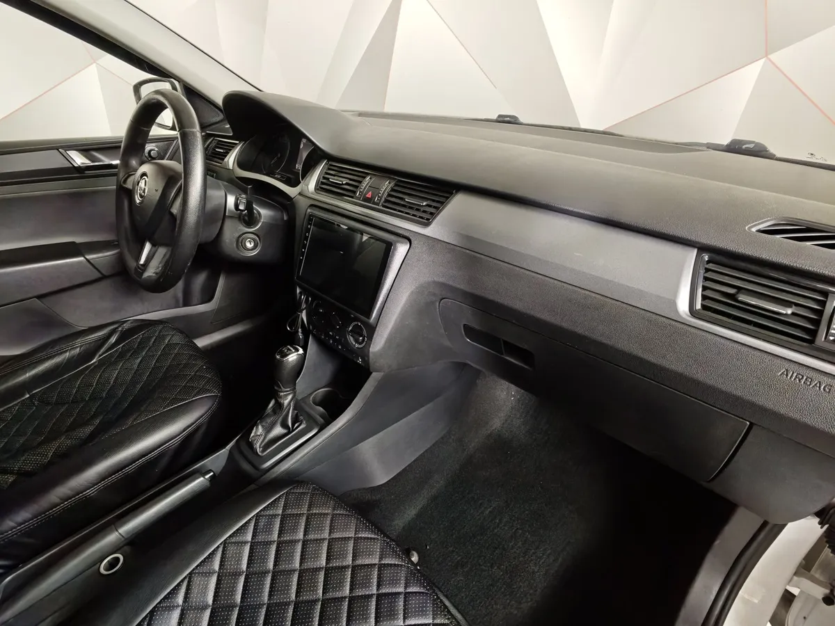Skoda Rapid 1.6 AT (110 л.с.) Белый в АВИЛОН. Слайд №13