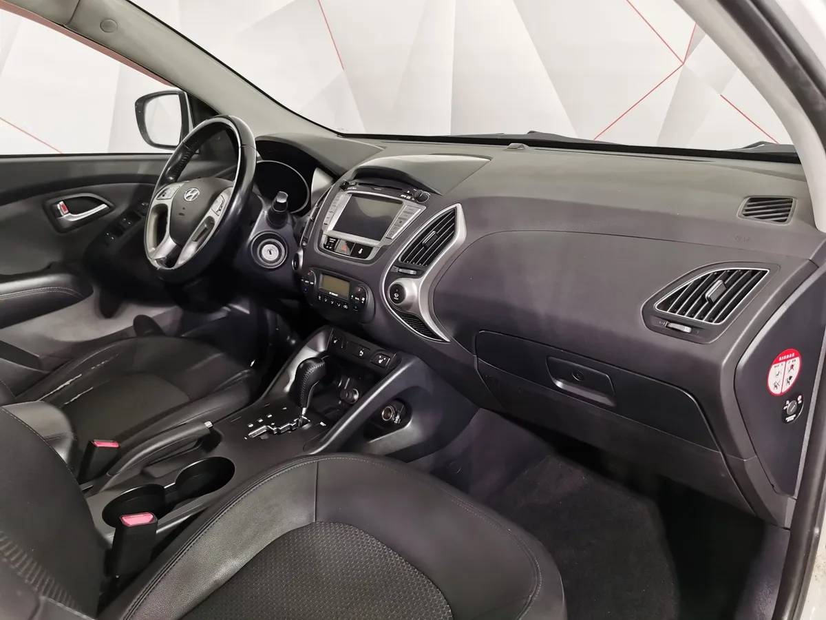 Hyundai ix35 2.0 AT 4WD (150 л.с.) Comfort + Navi Белый в АВИЛОН. Слайд №12