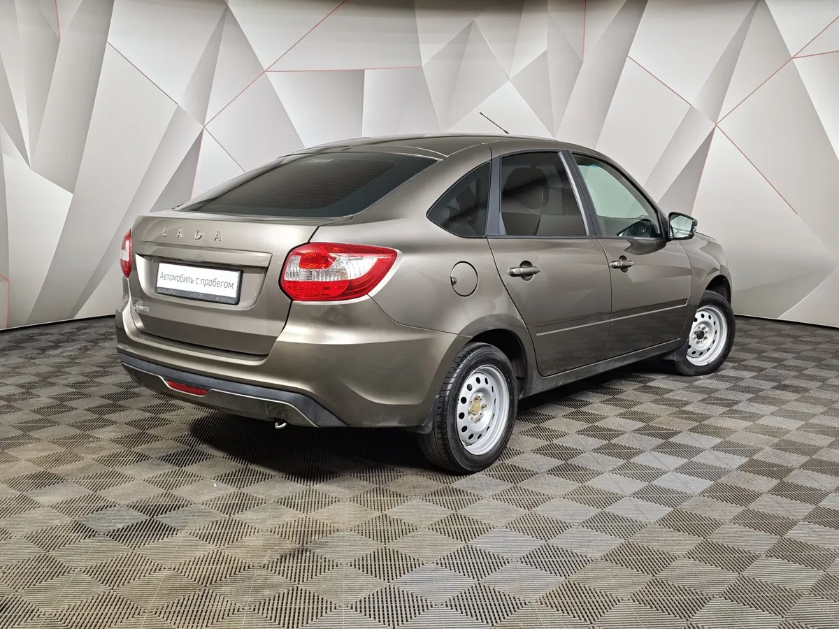 ВАЗ (Lada) Granta 1.6 MT (90 л.с.) Comfort Коричневый в АВИЛОН. Слайд №2