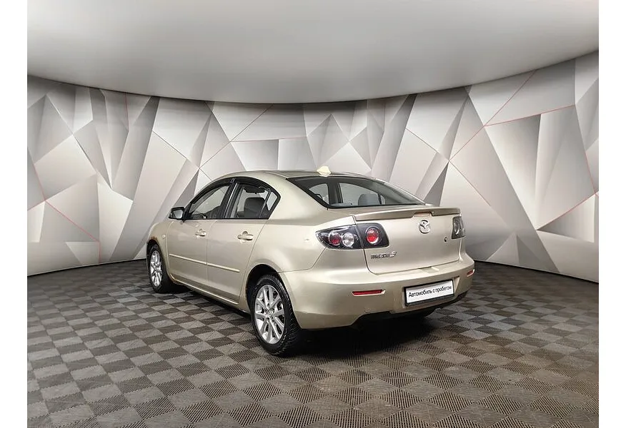 Mazda 3 1.6 AT (105 л.с.) Золотой в АВИЛОН. Слайд №7
