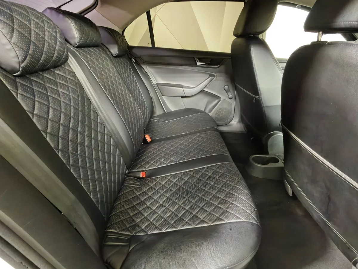 Skoda Rapid 1.6 AT (110 л.с.) Белый в АВИЛОН. Слайд №16