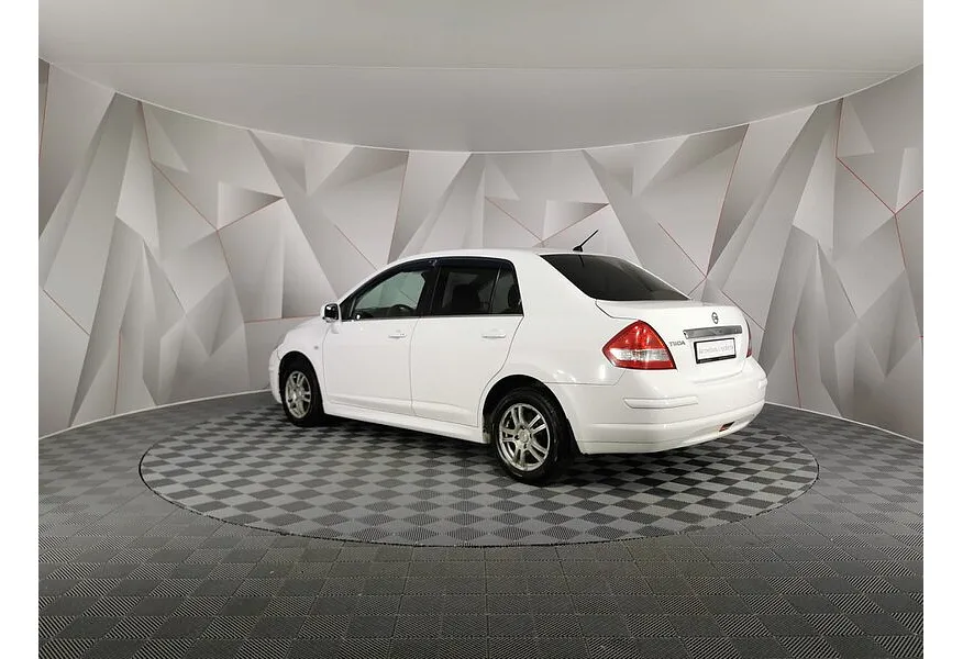 Nissan Tiida 1.6 AT (110 л.с.) Белый в АВИЛОН. Слайд №4