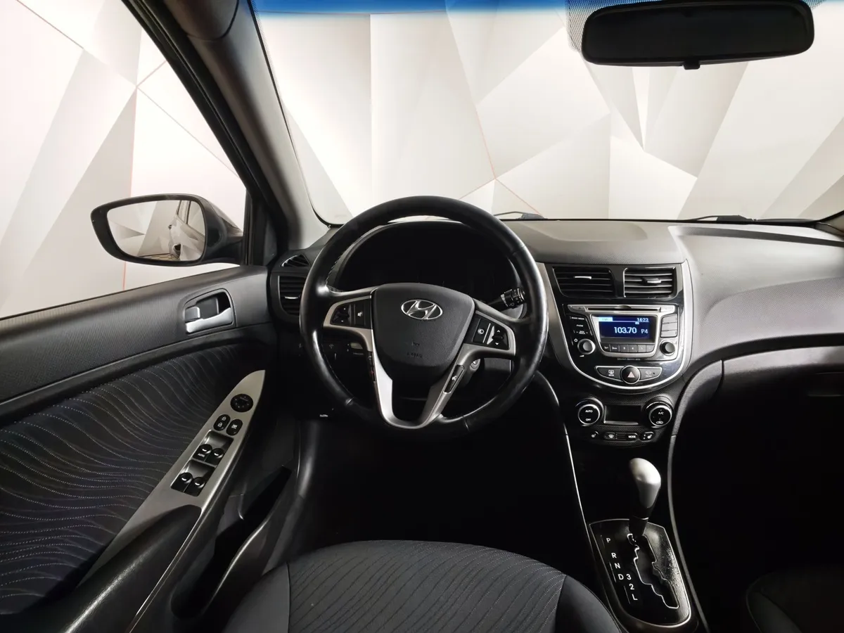 Hyundai Solaris 1.4 AT (107 л.с.) Style Черный в АВИЛОН. Слайд №19