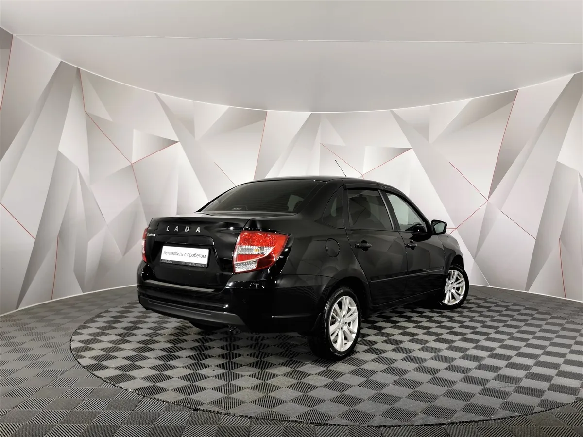 ВАЗ (Lada) Granta 1.6 MT 16кл (98 л.с.) Черный в АВИЛОН. Слайд №2