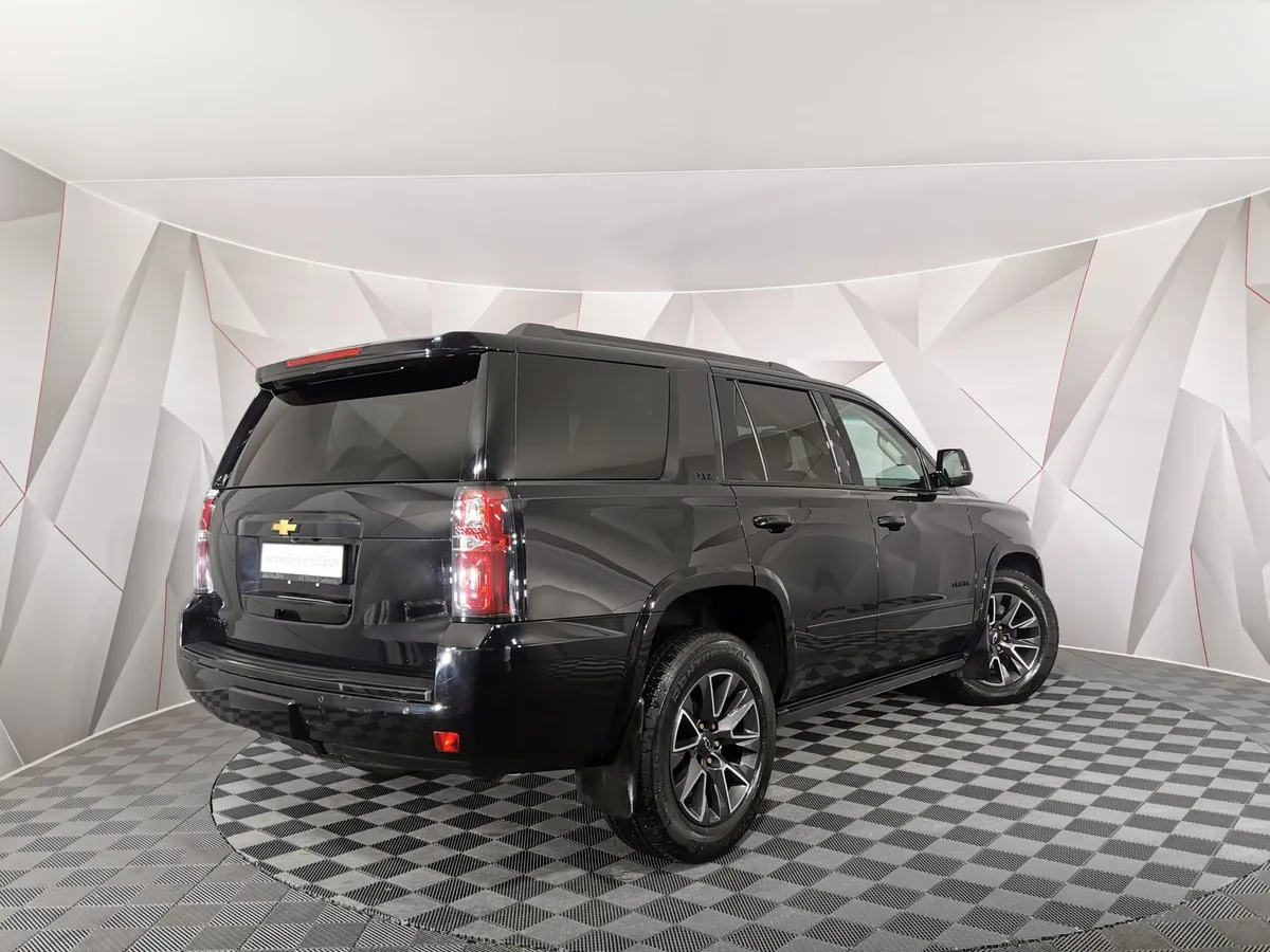 Chevrolet Tahoe 6.2 AT 4WD (409 л.с.) Черный в АВИЛОН. Слайд №2