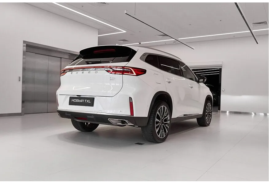 EXEED TXL 2.0 8AT AWD (197 л.с.) Flagship Белый в АВИЛОН. Слайд №3