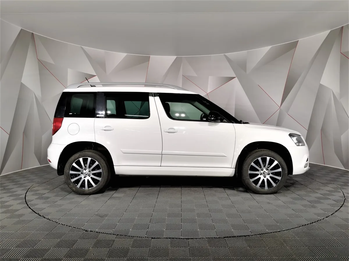 Skoda Yeti 1.6 AT (110 л.с.) Белый в АВИЛОН. Слайд №6