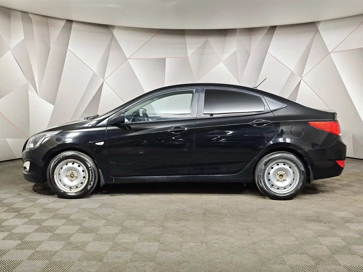 Hyundai Solaris 1.4 MT (107 л.с.) Comfort Черный в АВИЛОН. Слайд №5