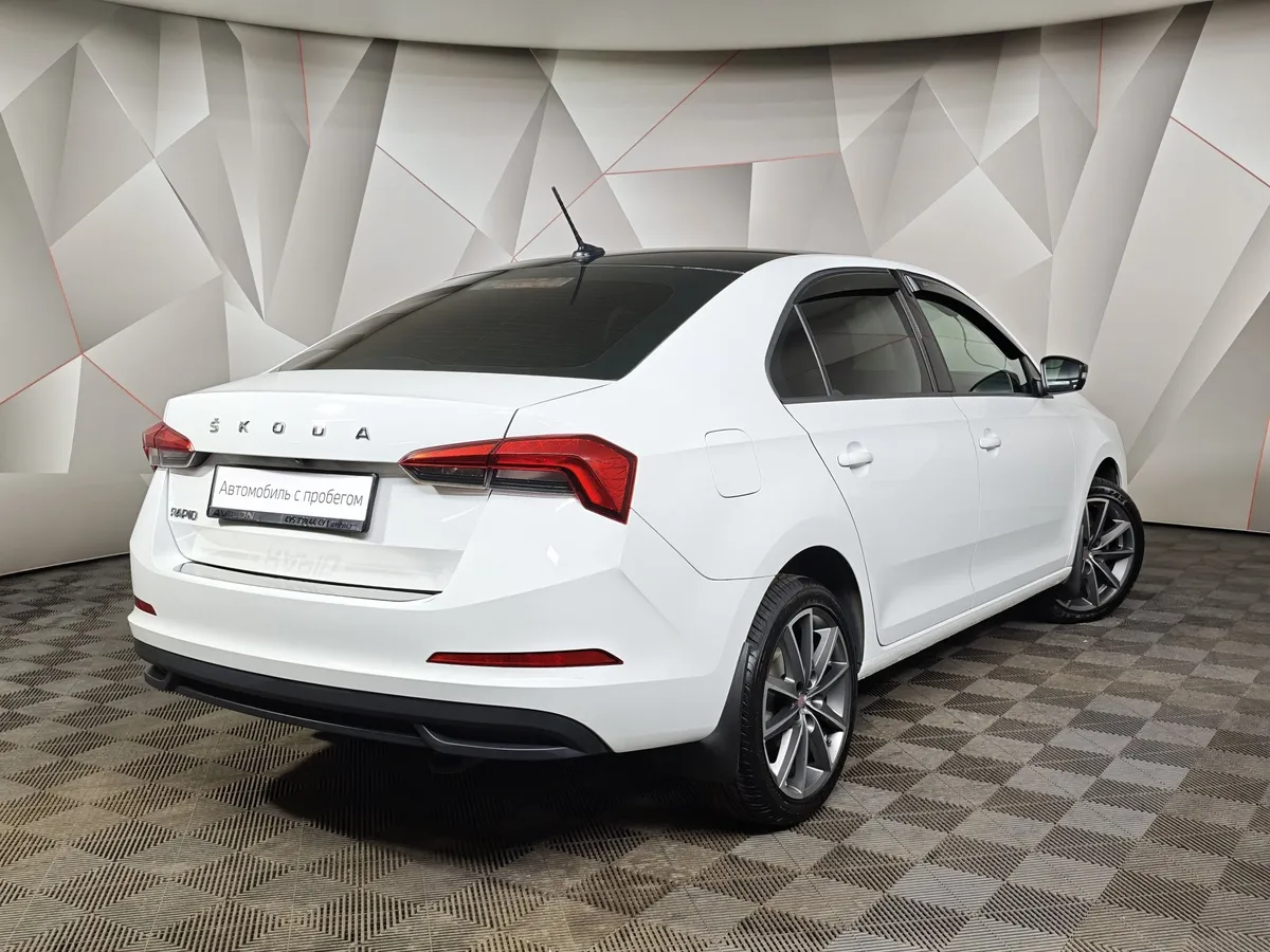 Skoda Rapid 1.6 MT (90 л.с.) Белый в АВИЛОН. Слайд №2