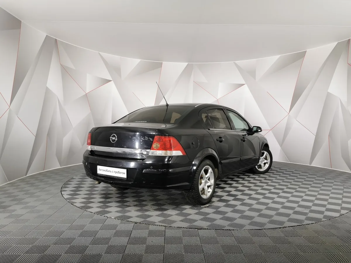 Opel Astra 1.8 AT (140 л.с.) base Черный в АВИЛОН. Слайд №2