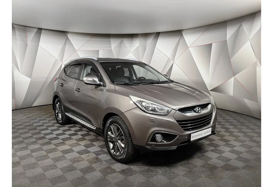 Hyundai ix35 2.0 AT 4WD (150 л.с.) Travel Коричневый в АВИЛОН. Слайд №3