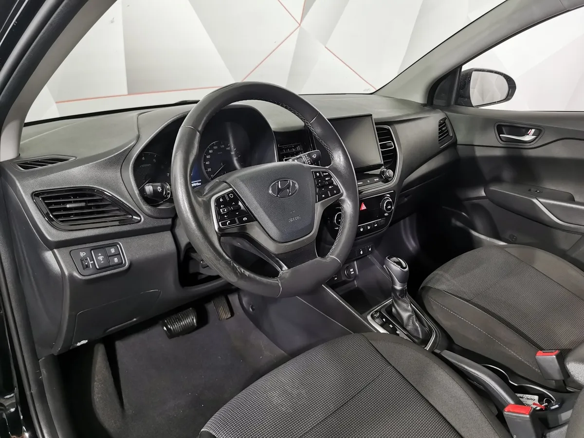 Hyundai Solaris 1.6 AT (123 л.с.) Comfort + Light Черный в АВИЛОН. Слайд №18