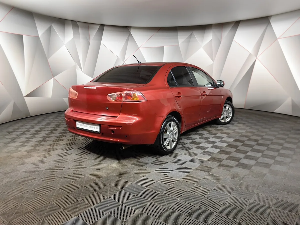 Mitsubishi Lancer 2.0 CVT 4WD (150 л.с.) Красный в АВИЛОН. Слайд №2