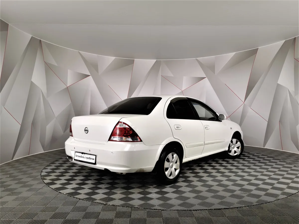 Nissan Almera Classic 1.6 AT (107 л.с.) Белый в АВИЛОН. Слайд №2