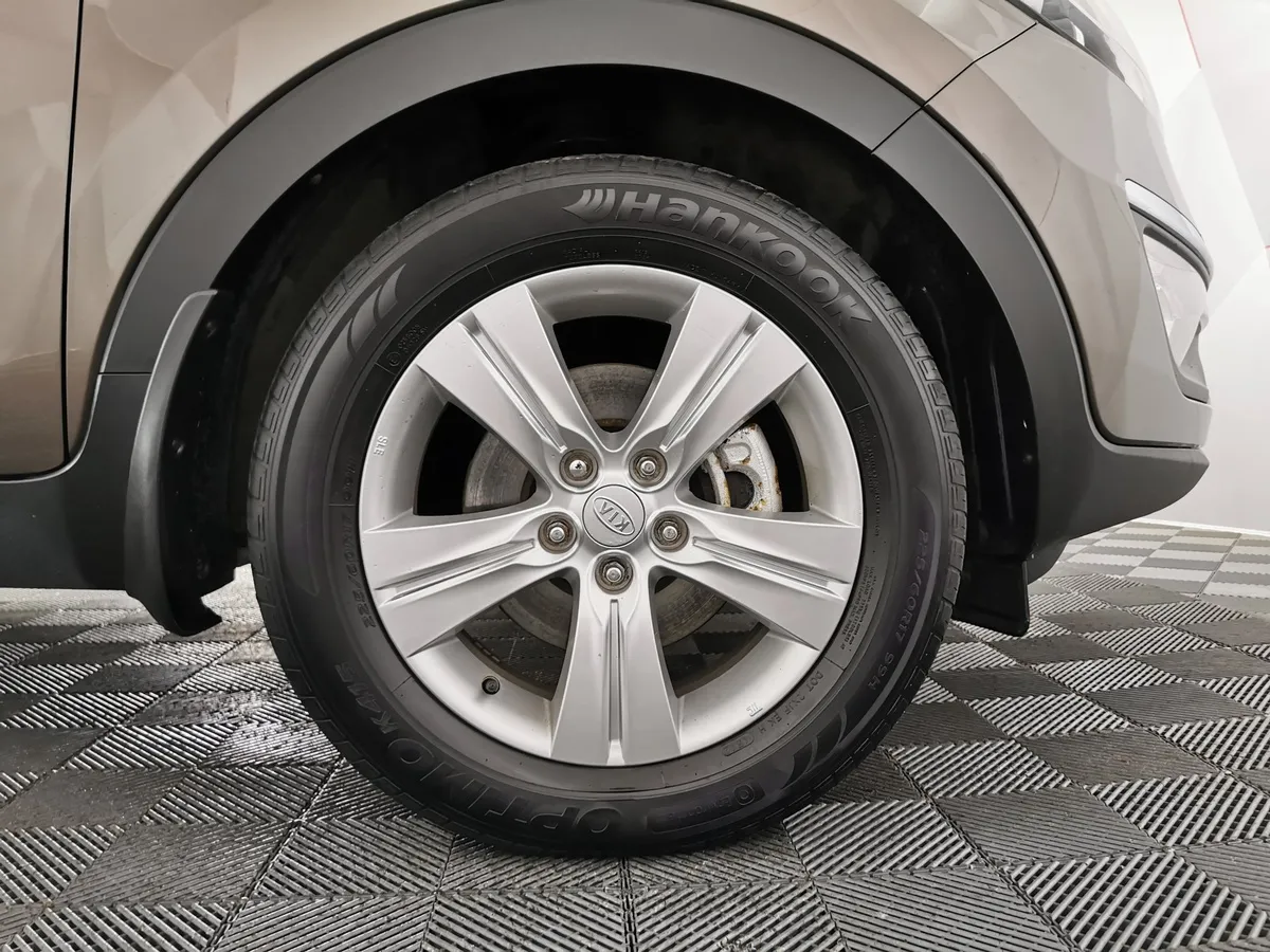 Kia Sportage 2.0 AT 4WD (150 л.с.) Luxe Коричневый в АВИЛОН. Слайд №8
