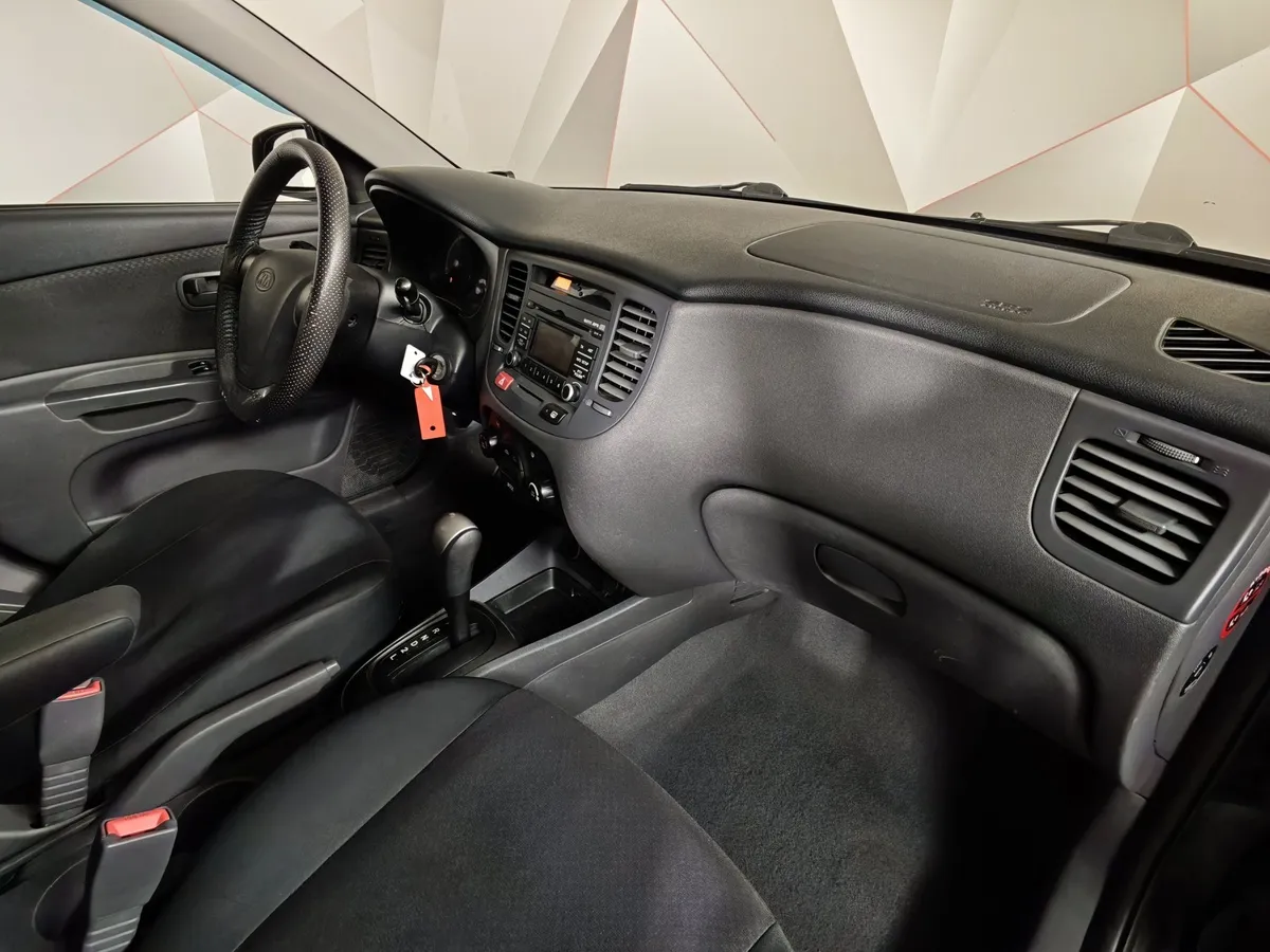 Kia Rio 1.4 AT (97 л.с.) Черный в АВИЛОН. Слайд №11