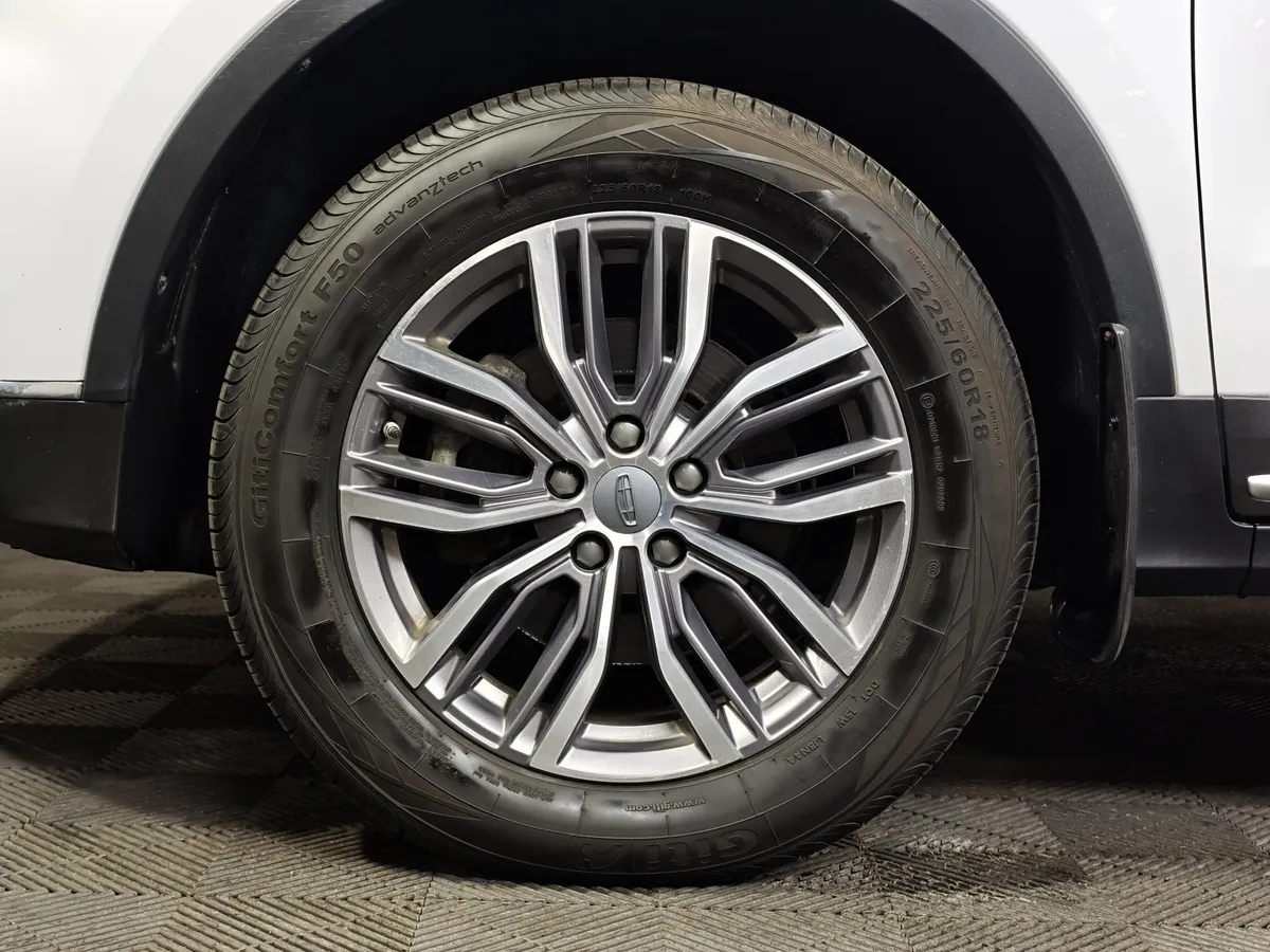 Geely Atlas Pro 1.5T 7DCT AWD (177 л.с.) Flagship Белый в АВИЛОН. Слайд №9