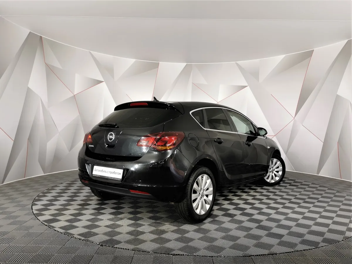 Opel Astra 1.6 AT (115 л.с.) Черный в АВИЛОН. Слайд №2