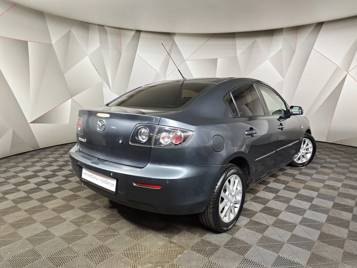 Mazda 3 2.0 AT (150 л.с.) Серый в АВИЛОН. Слайд №2