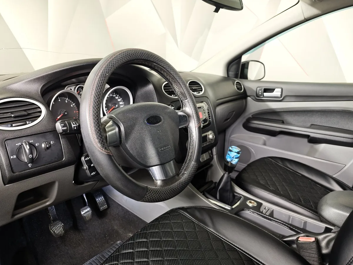 Ford Focus 1.8 MT (125 л.с.) Ghia Черный в АВИЛОН. Слайд №19