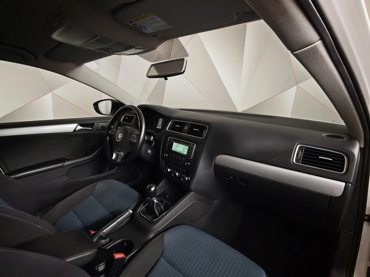Volkswagen Jetta 1.6 MPI MT (90 л.с.) Trendline Белый в АВИЛОН. Слайд №12