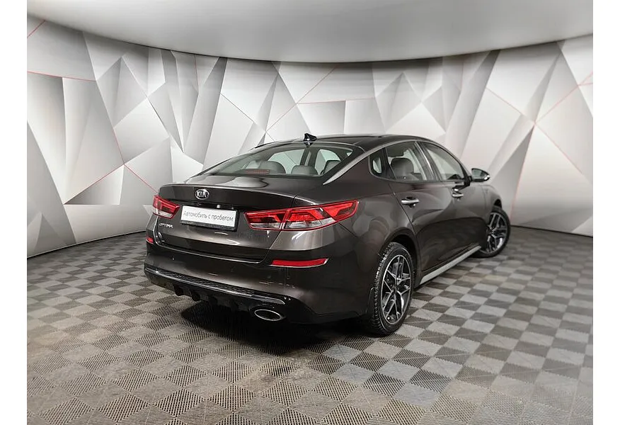 Kia Optima 2.0 AT (150 л.с.) Коричневый в АВИЛОН. Слайд №2