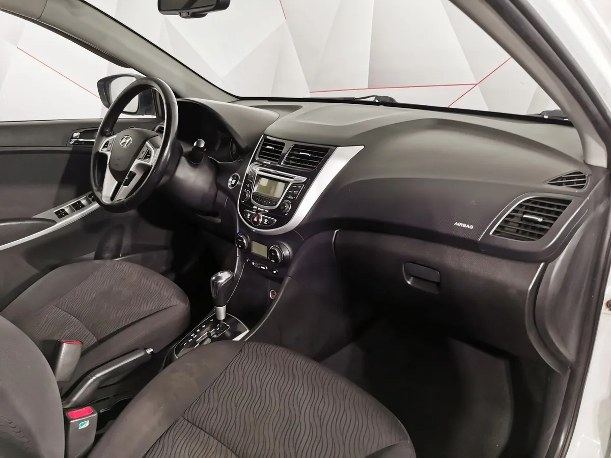 Hyundai Solaris 1.6 AT (123 л.с.) Elegance Белый в АВИЛОН. Слайд №11