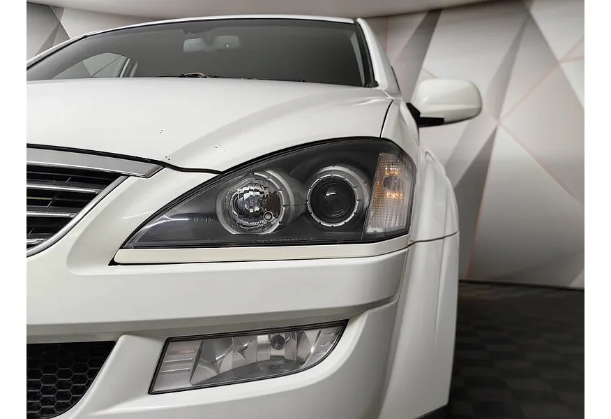 SsangYong Kyron 2.0 Xdi E-Tronic 4WD (141 л.с.) Белый в АВИЛОН. Слайд №10