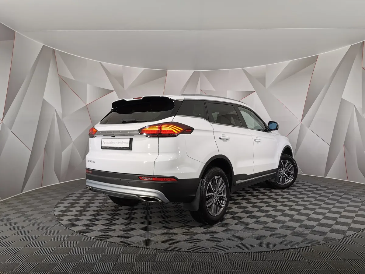 Geely Atlas Pro 1.5T AT FWD (177 л.с.) Luxury Белый в АВИЛОН. Слайд №2