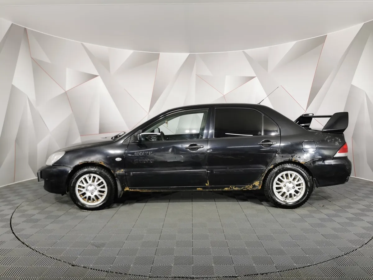 Mitsubishi Lancer 1.3 MT (82 л.с.) Черный в АВИЛОН. Слайд №5