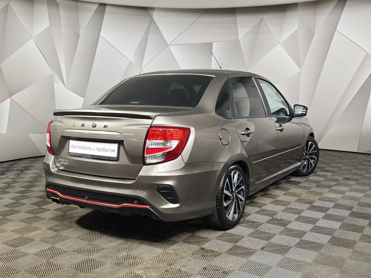 ВАЗ (Lada) Granta 1.6 MT FWD (118 л.с.) Enjoy Коричневый в АВИЛОН. Слайд №2