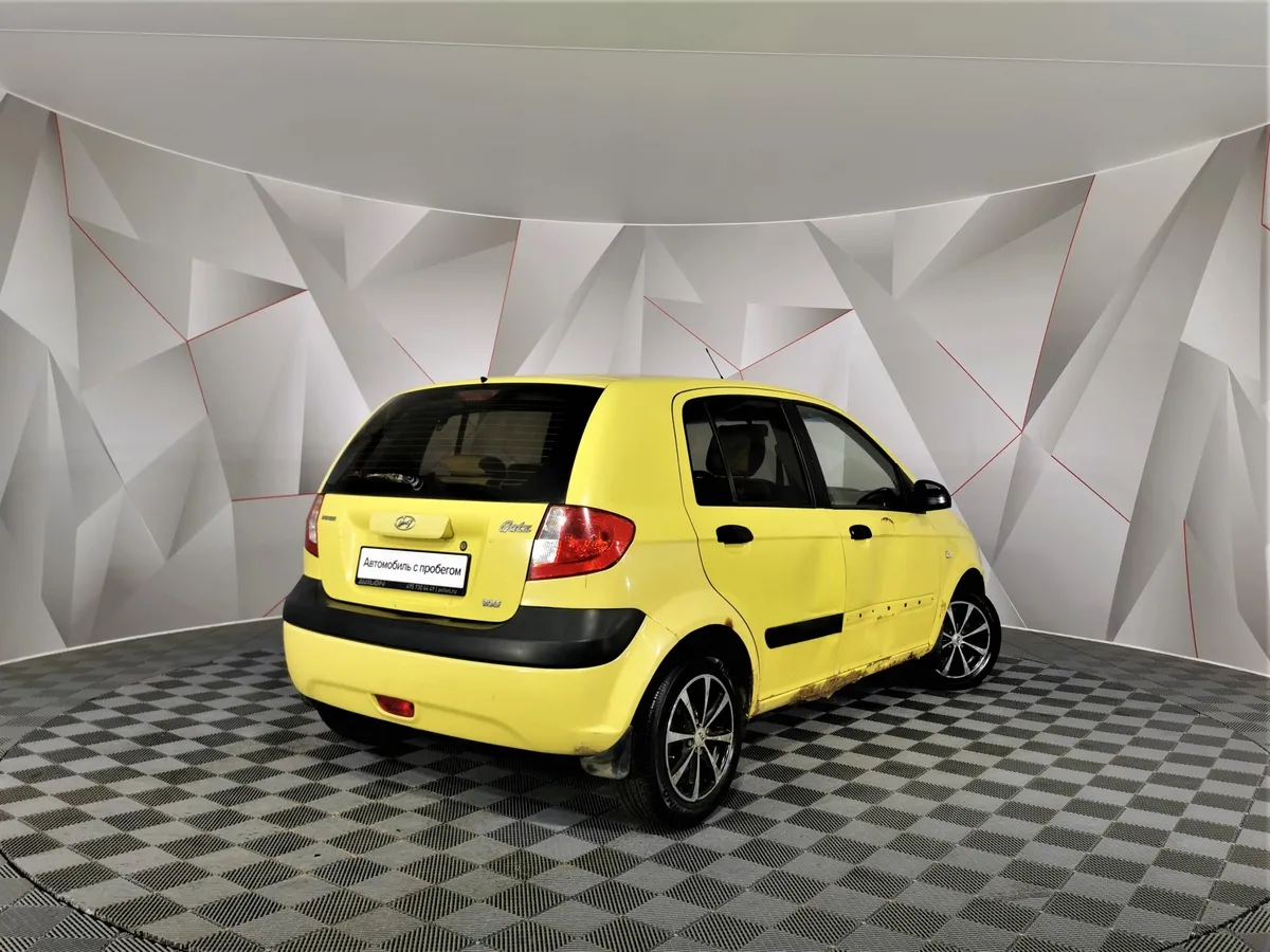 Hyundai Getz 1.4 MT (97 л.с.) Желтый в АВИЛОН. Слайд №2