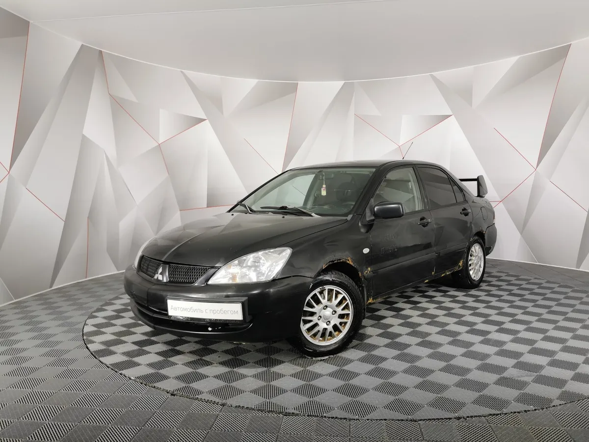 АВИЛОН - Mitsubishi Lancer 1.3 MT (82 л.с.) Черный - slide 9992391