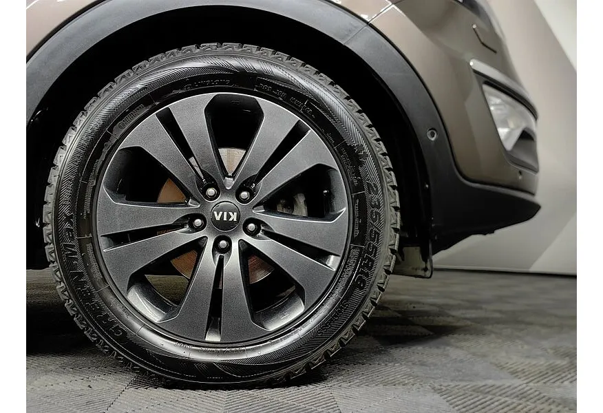 Kia Sportage 2.0 AT 4WD (150 л.с.) Luxe Коричневый в АВИЛОН. Слайд №9