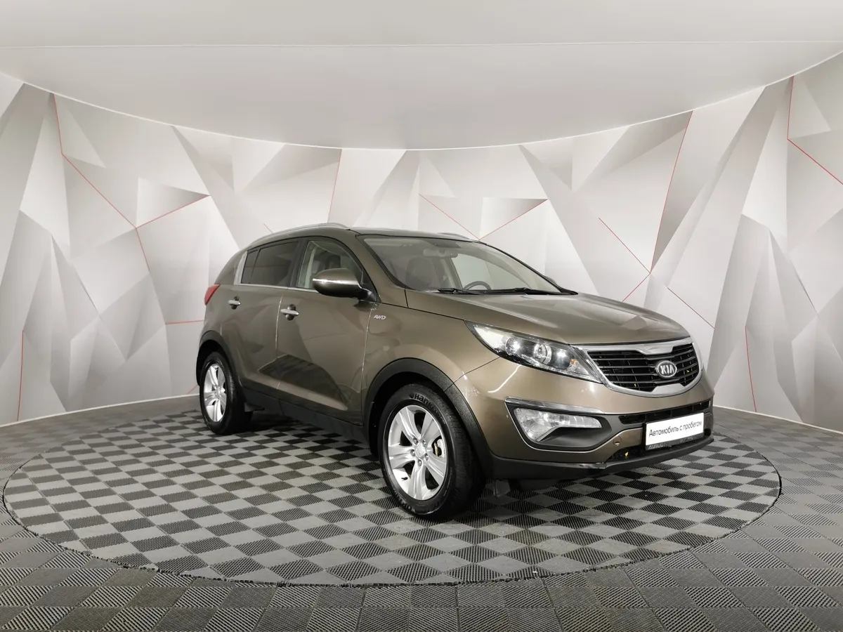 Kia Sportage 2.0 AT 4WD (150 л.с.) Luxe Коричневый в АВИЛОН. Слайд №3