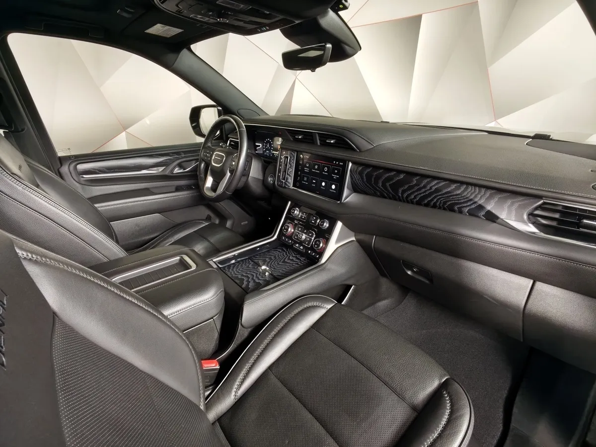 GMC Yukon 6.2 AT 4WD (426 л.с.) 7 мест Denali Ultimate Черный в АВИЛОН. Слайд №11