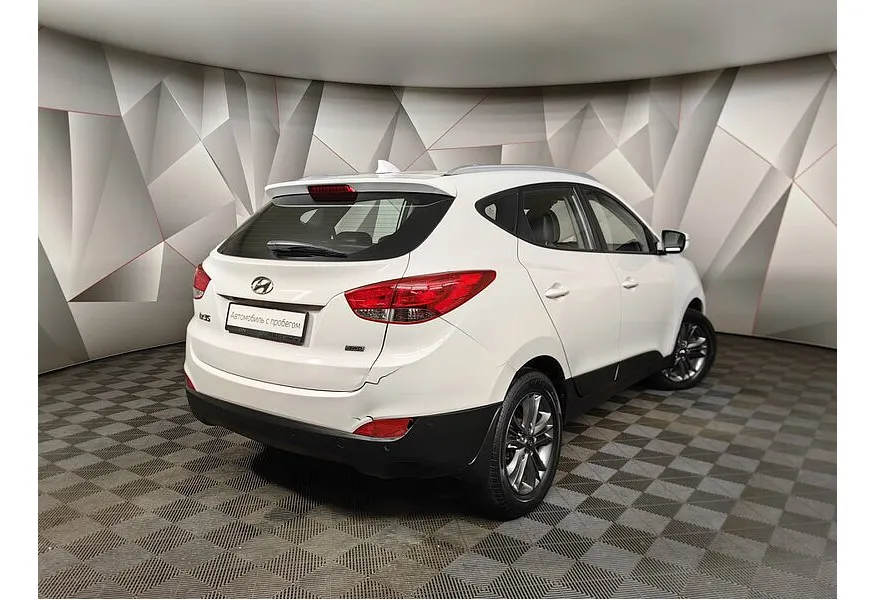 Hyundai ix35 2.0 AT 4WD (150 л.с.) Comfort + Navi Белый в АВИЛОН. Слайд №8