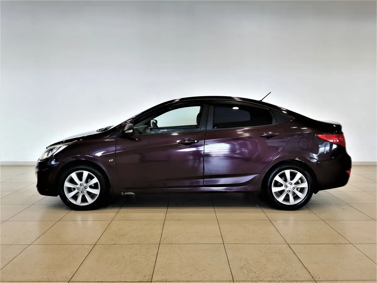 Hyundai Solaris 1.6 AT (123 л.с.) Elegance + Prestige + Safety Фиолетовый в АВИЛОН. Слайд №5