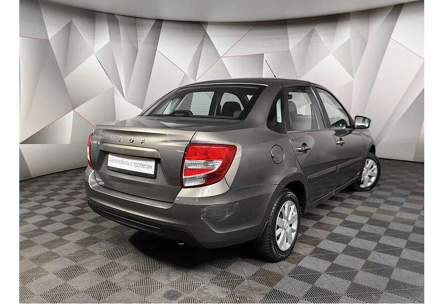ВАЗ (Lada) Granta 1.6 AT 16кл (98 л.с.) Коричневый в АВИЛОН. Слайд №8