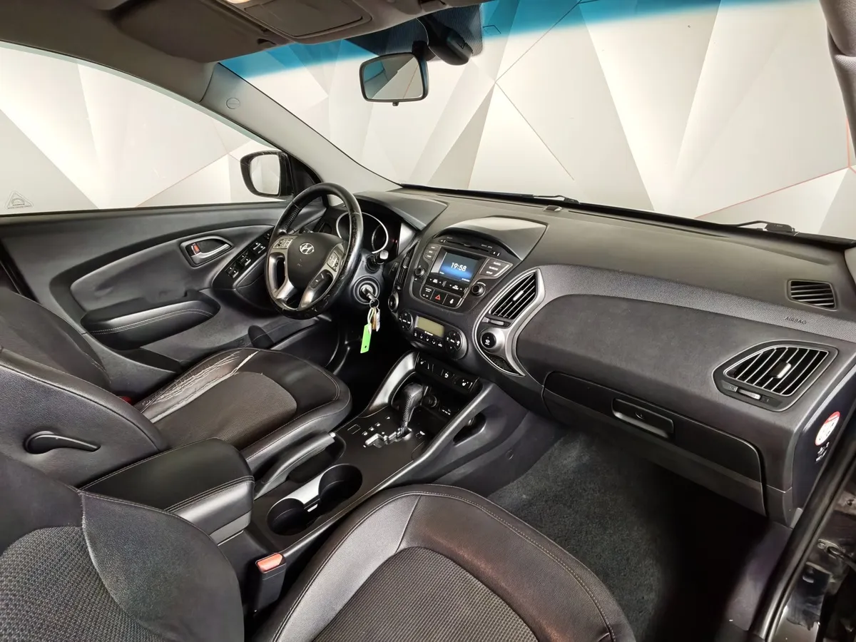 Hyundai ix35 2.0 AT 4WD (150 л.с.) Comfort Черный в АВИЛОН. Слайд №13