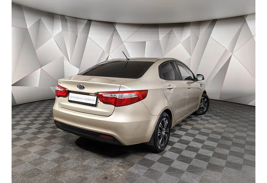 Kia Rio 1.4 MT (107 л.с.) Бежевый в АВИЛОН. Слайд №2