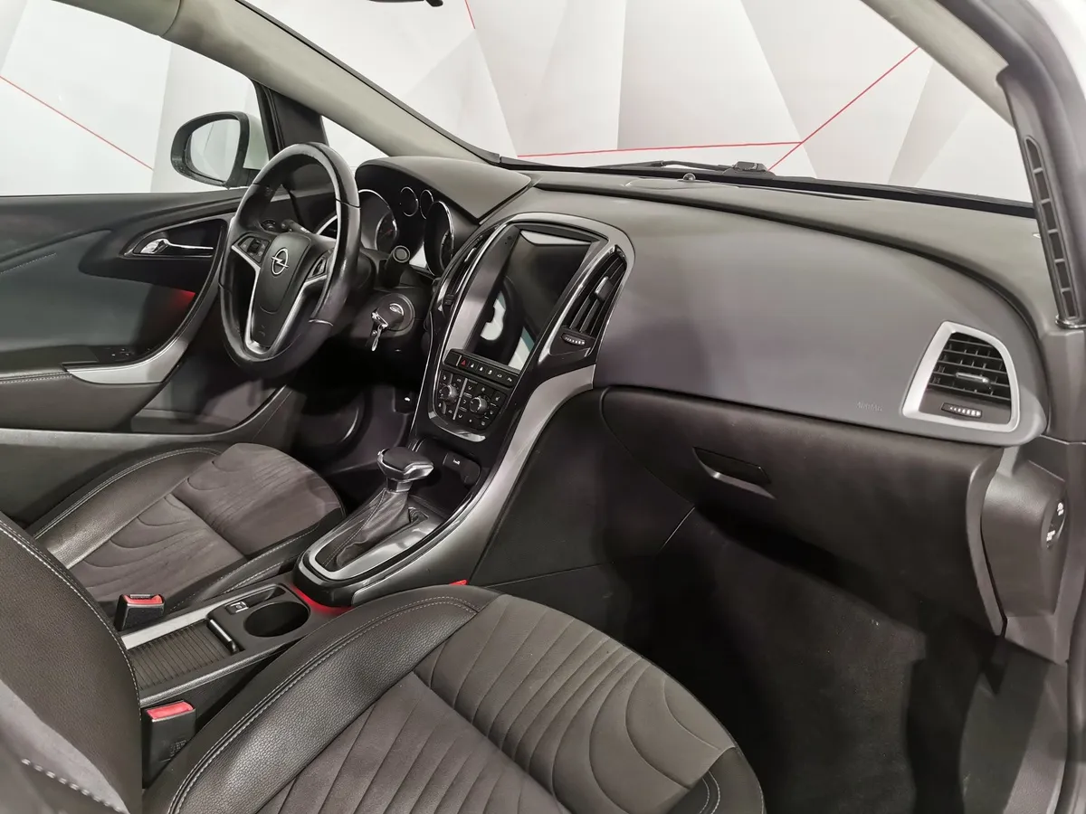 Opel Astra 1.6 AT (115 л.с.) Белый в АВИЛОН. Слайд №12