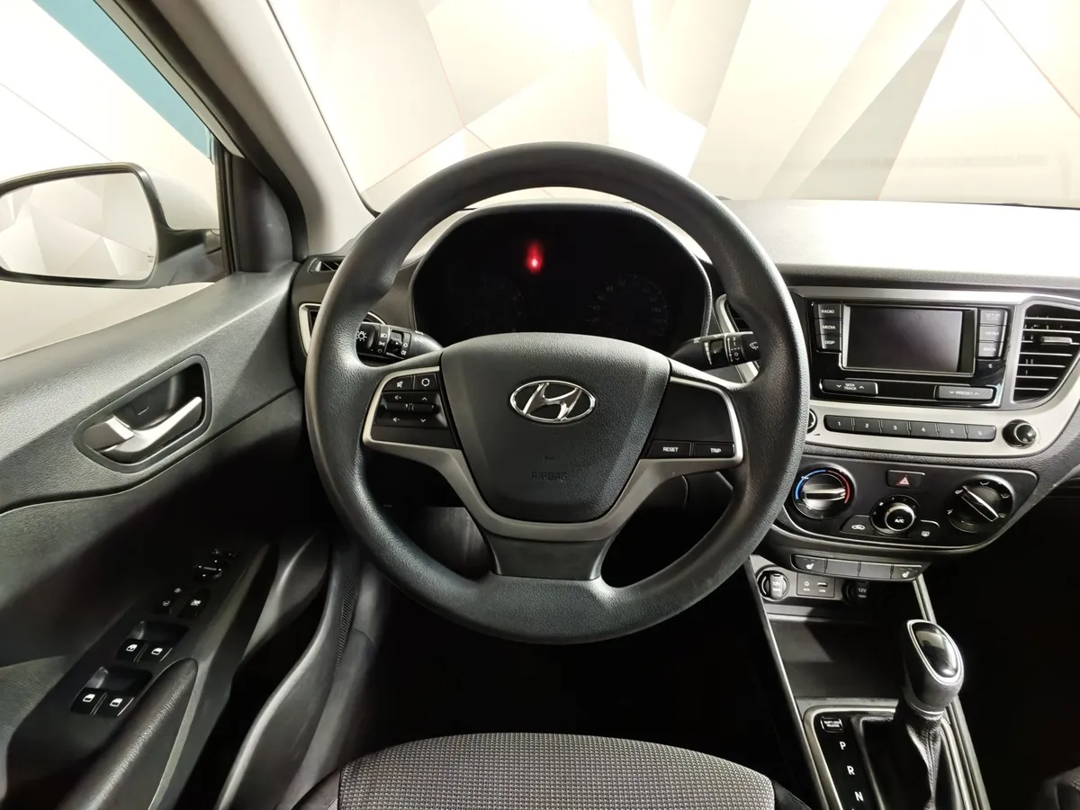 Hyundai Solaris 1.4 AT (107 л.с.) Active Белый в АВИЛОН. Слайд №20